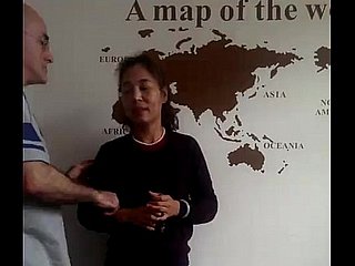 Amerikanischer Mann und seine chinesische Frau und ein chinesischer Junge drei Reihen Dongguan